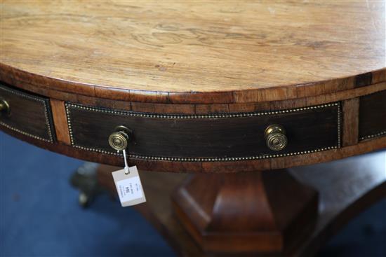 A 19th century circular rosewood drum table, stamped Gregory & Co, Regent Street, London, W.3ft 6in.